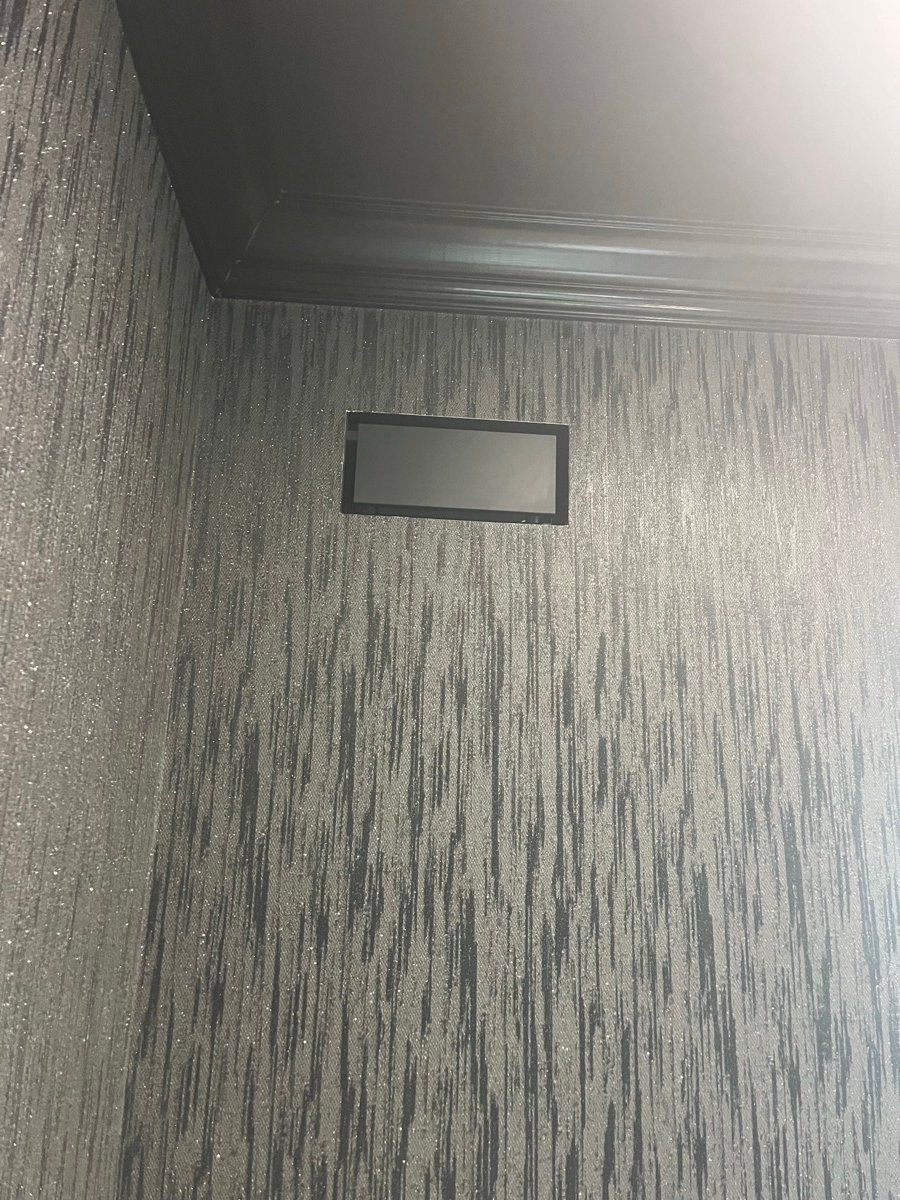 Fittes Aria Lite flush vent with wallpaper finish